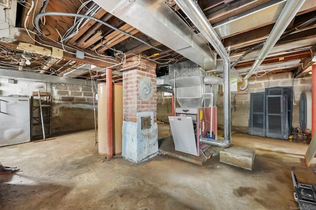 283 Derby Ave, Orange, CT 06477 - unfinished below grade area featuring gas water heater and heating unit