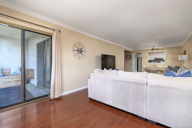 910 Hope St Unit 10B, Stamford, CT 06907 - living area featuring wood finished floors, ornamental molding, a ceiling fan, and baseboards