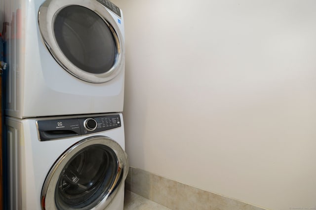 910 Hope St Unit 10B, Stamford, CT 06907 - laundry room with stacked washing machine and dryer