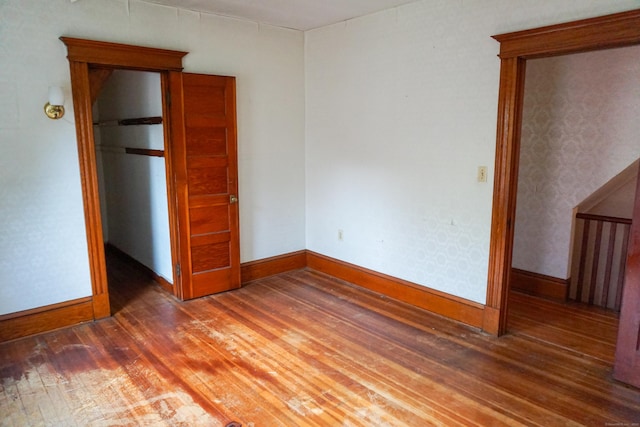47 Mountford St, Hartford, CT 06114 - empty room with wood finished floors and baseboards