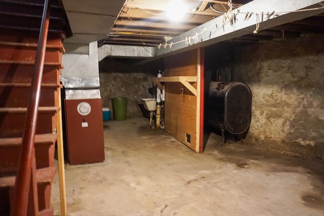 47 Mountford St, Hartford, CT 06114 - unfinished below grade area featuring oil tank and a sink