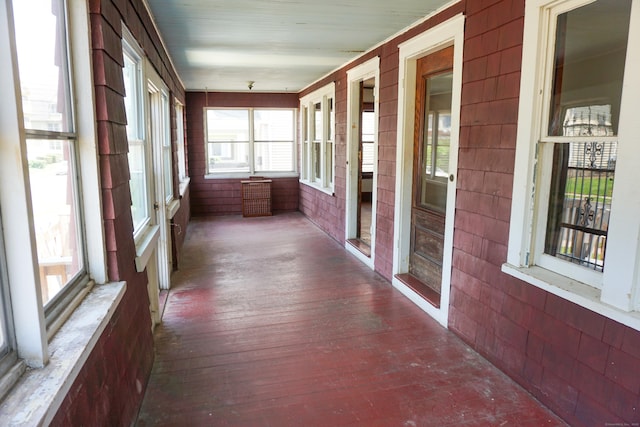 47 Mountford St, Hartford, CT 06114 - unfurnished sunroom featuring hardwood / wood-style floors and wooden walls