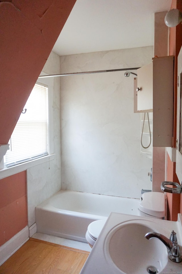 47 Mountford St, Hartford, CT 06114 - bathroom featuring a bath and wood finished floors