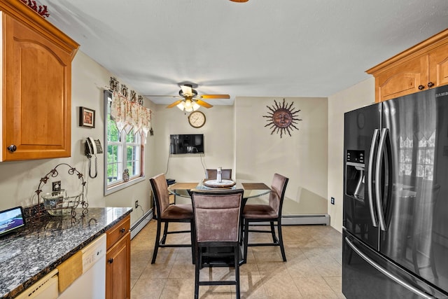 2 Marion Ln, Canterbury, CT 06331 - dining space featuring a baseboard heating unit, ceiling fan, and light tile patterned flooring
