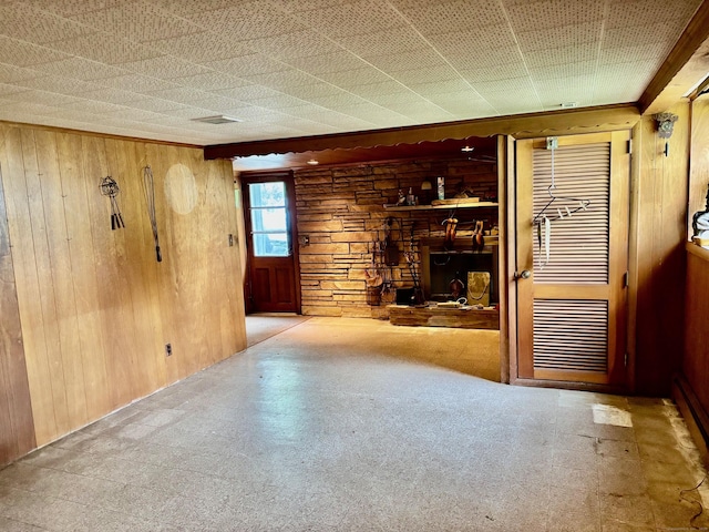 56 Clapboard Ridge Rd, Danbury, CT 06811 - unfurnished living room with wooden walls and tile patterned floors