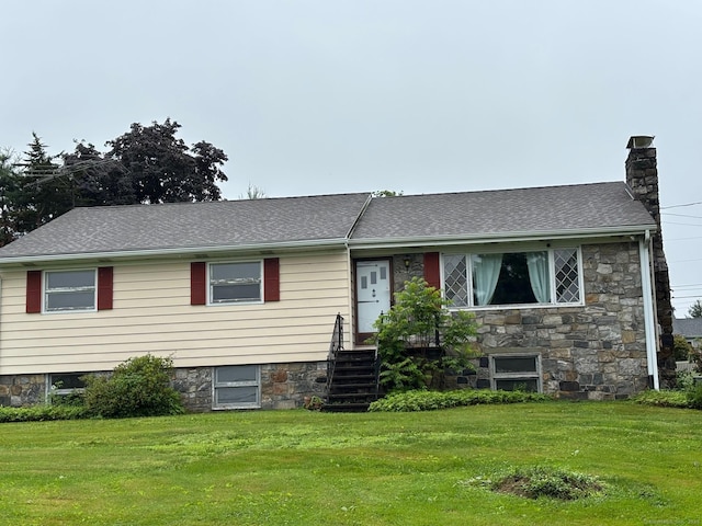 56 Clapboard Ridge Rd, Danbury, CT 06811 - view of front of house featuring a front yard, a chimney, stone siding, and a shingled roof