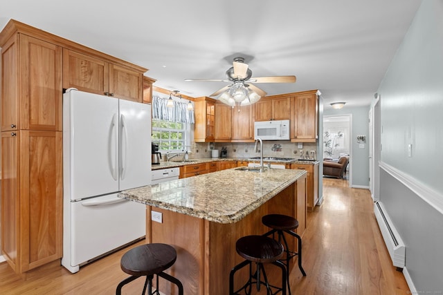 183 Brentmoor Rd, East Hartford, CT 06118 - kitchen with white appliances, baseboard heating, light wood-type flooring, and tasteful backsplash