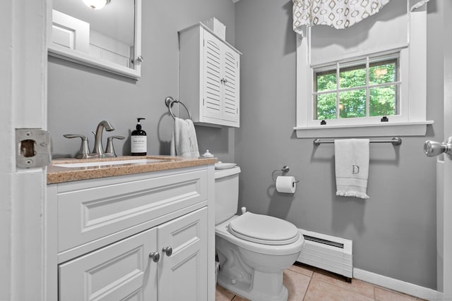 183 Brentmoor Rd, East Hartford, CT 06118 - bathroom with a baseboard radiator, tile patterned floors, and vanity