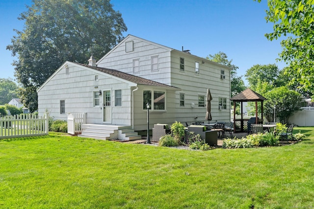 183 Brentmoor Rd, East Hartford, CT 06118 - back of property with an outdoor living space, a gazebo, and a patio