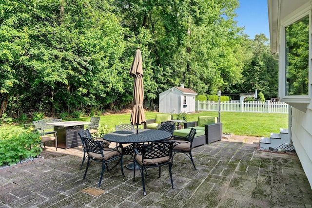 183 Brentmoor Rd, East Hartford, CT 06118 - view of patio / terrace with a storage unit and outdoor dining area