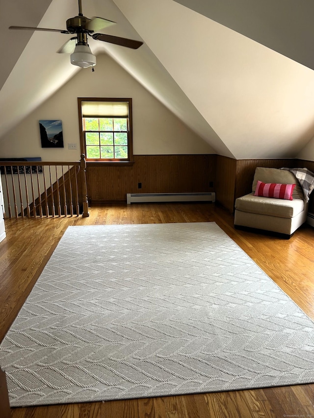 19 Orchard Ln, New Canaan, CT 06840 - bonus room featuring a baseboard radiator, a ceiling fan, wood finished floors, lofted ceiling, and a wainscoted wall