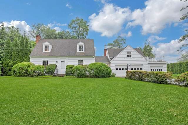 19 Orchard Ln, New Canaan, CT 06840 - rear view of house with a lawn, an attached garage, and a chimney