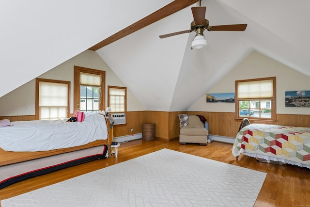 19 Orchard Ln, New Canaan, CT 06840 - bedroom featuring baseboard heating, vaulted ceiling, wood finished floors, wainscoting, and wood walls