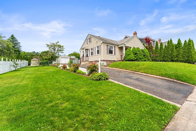 72 Westminster St, Hamden, CT 06518 - view of front of home with driveway and an outbuilding
