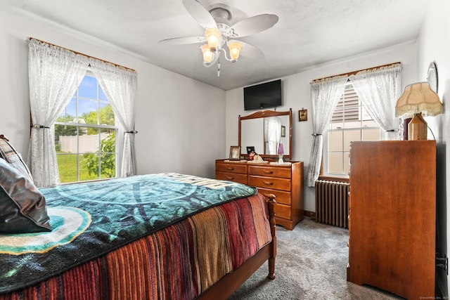 72 Westminster St, Hamden, CT 06518 - bedroom featuring radiator heating unit, light carpet, and ceiling fan