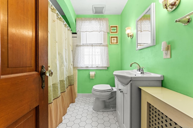 72 Westminster St, Hamden, CT 06518 - full bathroom featuring tile patterned floors, toilet, vanity, and curtained shower