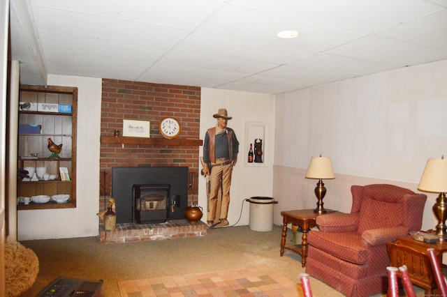 76 Country Ln, Bristol, CT 06010 - living room with carpet flooring, wood walls, and a drop ceiling