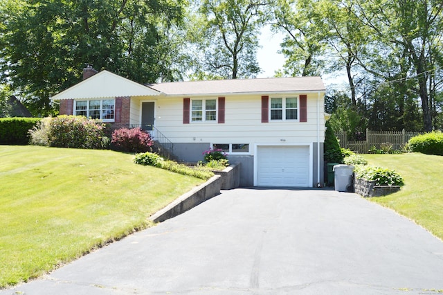 76 Country Ln, Bristol, CT 06010 - view of front of house featuring driveway and an attached garage