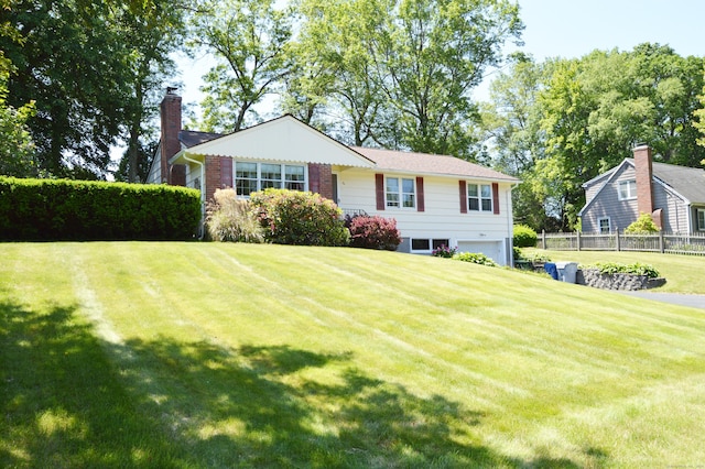 76 Country Ln, Bristol, CT 06010 - view of front of property featuring a chimney and an attached garage