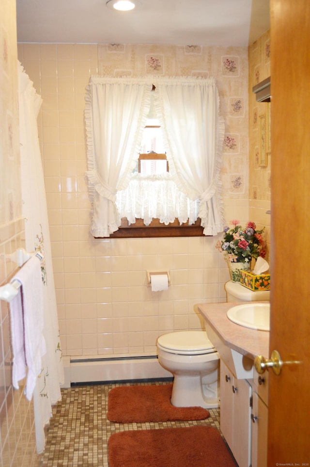76 Country Ln, Bristol, CT 06010 - full bath with vanity, toilet, baseboard heating, and tile walls