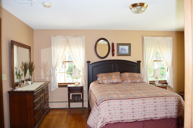 76 Country Ln, Bristol, CT 06010 - bedroom featuring dark wood-style flooring and a baseboard radiator