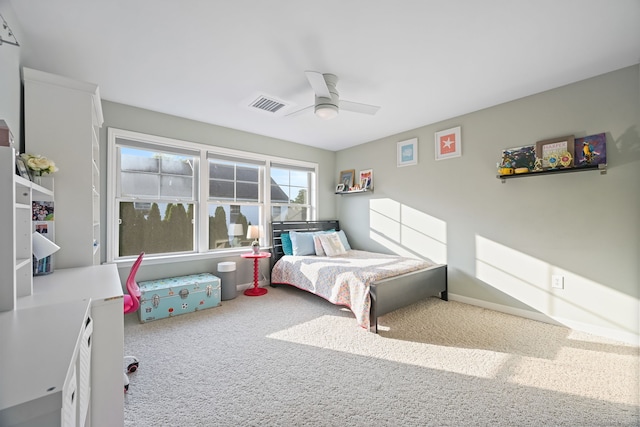 carpeted bedroom with a ceiling fan