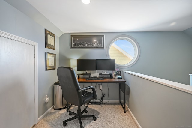 carpeted office with baseboards