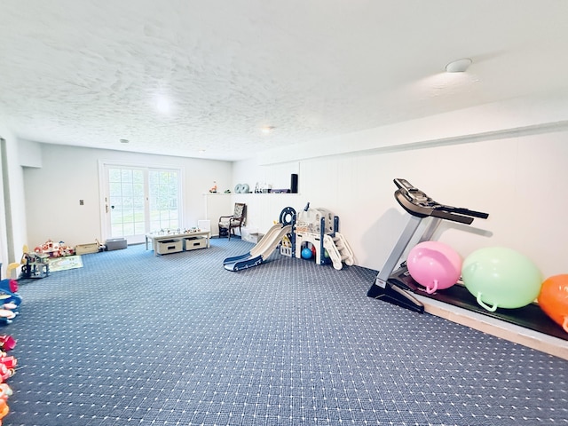 51 Boulder Brook Dr, Stamford, CT 06903 - exercise area with carpet floors and a textured ceiling