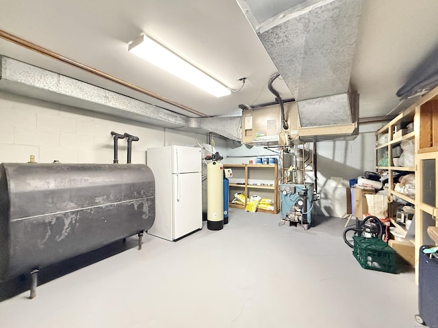 51 Boulder Brook Dr, Stamford, CT 06903 - unfinished basement with freestanding refrigerator and heating fuel