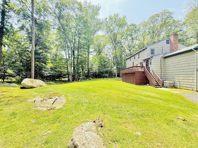 51 Boulder Brook Dr, Stamford, CT 06903 - view of grassy yard with stairs and a wooden deck