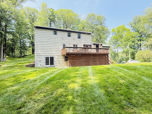 51 Boulder Brook Dr, Stamford, CT 06903 - rear view of house with a wooden deck and a lawn