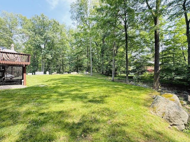 51 Boulder Brook Dr, Stamford, CT 06903 - view of green lawn with a wooden deck