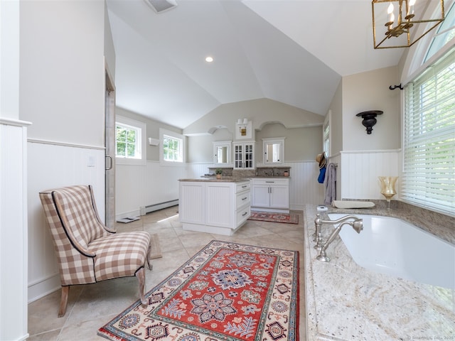 111 Washington Post Dr, Wilton, CT 06897 - full bath featuring a wainscoted wall, vanity, a baseboard heating unit, a garden tub, and vaulted ceiling