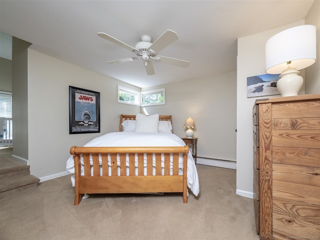 111 Washington Post Dr, Wilton, CT 06897 - bedroom featuring baseboard heating, light carpet, and baseboards