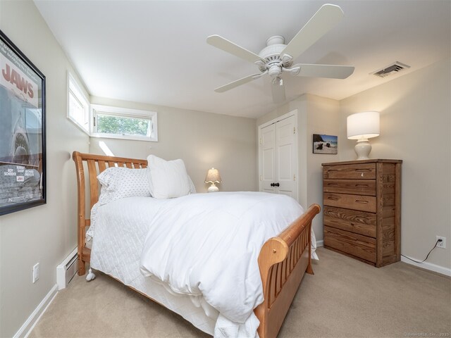 111 Washington Post Dr, Wilton, CT 06897 - bedroom with light carpet, baseboards, ceiling fan, and a closet