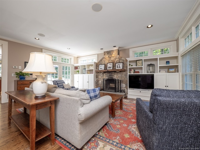 111 Washington Post Dr, Wilton, CT 06897 - living room with crown molding, a stone fireplace, wood finished floors, and recessed lighting