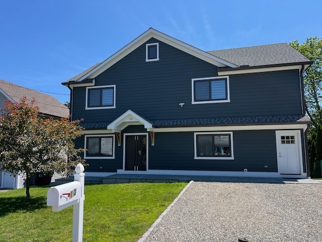10 Andover Rd, Stamford, CT 06902 - traditional home with a front yard and a shingled roof