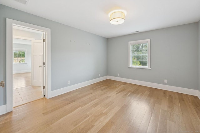 27 Waverly Rd, Darien, CT 06820 - spare room featuring healthy amount of natural light, light wood-style floors, and baseboards