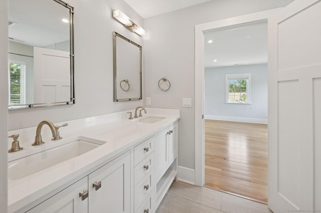 27 Waverly Rd, Darien, CT 06820 - full bath with double vanity, baseboards, and recessed lighting