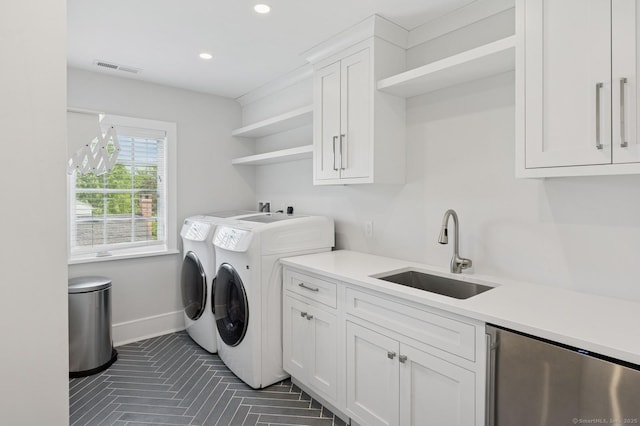 27 Waverly Rd, Darien, CT 06820 - laundry area with washing machine and dryer, cabinet space, recessed lighting, baseboards, and dark tile patterned floors