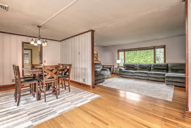 202 Mountain Rd, Cheshire, CT 06410 - dining area featuring a chandelier and wood finished floors