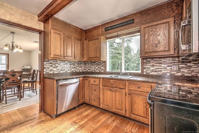 202 Mountain Rd, Cheshire, CT 06410 - kitchen with dishwasher, black / electric stove, dark countertops, a sink, and backsplash