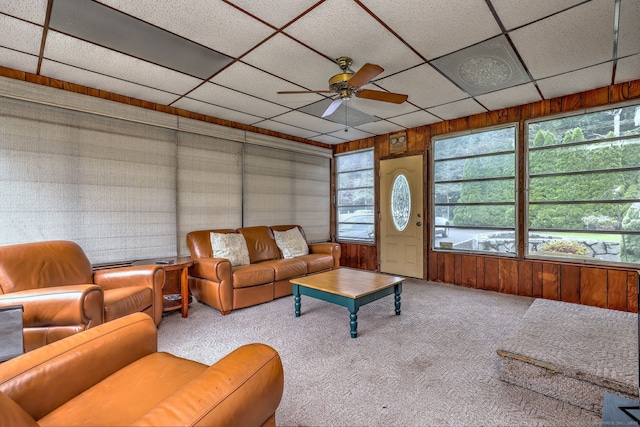 202 Mountain Rd, Cheshire, CT 06410 - carpeted living room featuring ceiling fan, a paneled ceiling, and wooden walls