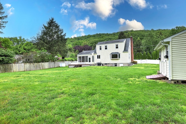202 Mountain Rd, Cheshire, CT 06410 - back of house with a wooden deck and a chimney