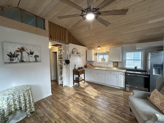 28 1st St, Madison, CT 06443 - kitchen featuring appliances with stainless steel finishes, a ceiling fan, an AC wall unit, white cabinetry, and wooden ceiling