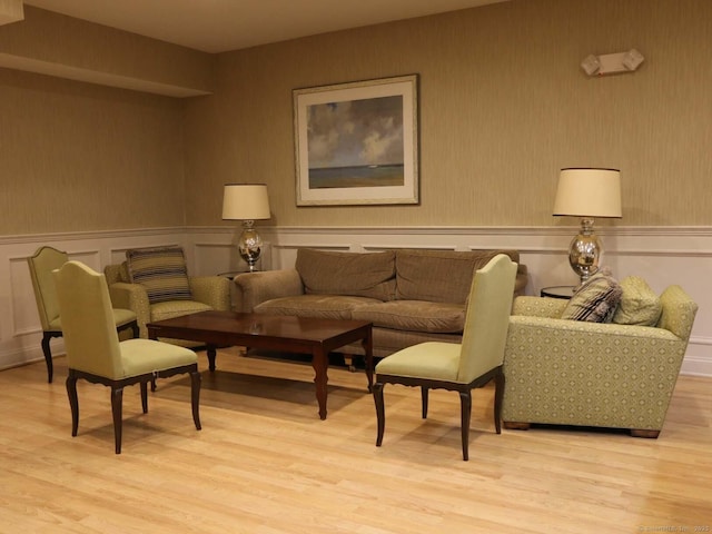144 E Ave Apt B106, Norwalk, CT 06851 - living area featuring wainscoting, light wood-type flooring, and wallpapered walls