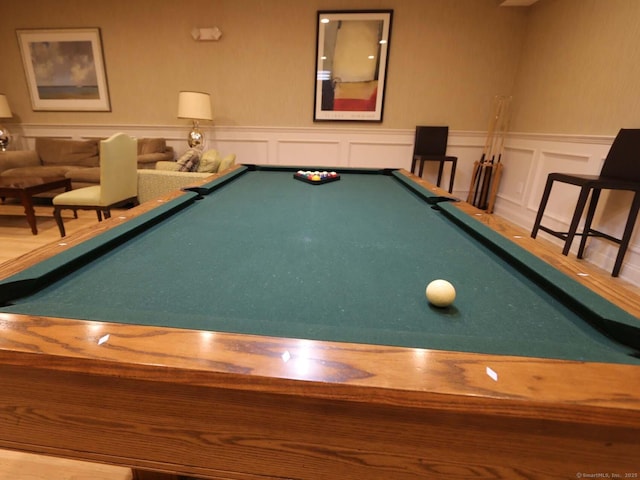 144 E Ave Apt B106, Norwalk, CT 06851 - rec room featuring pool table, a decorative wall, and wainscoting