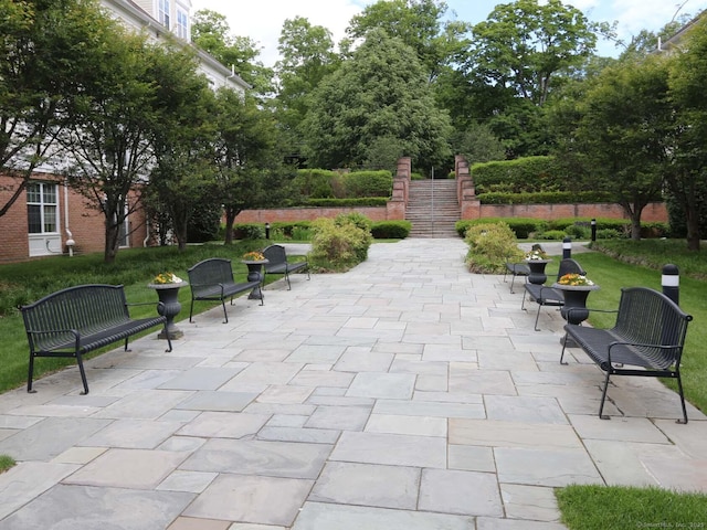 144 E Ave Apt B106, Norwalk, CT 06851 - view of patio / terrace featuring stairway