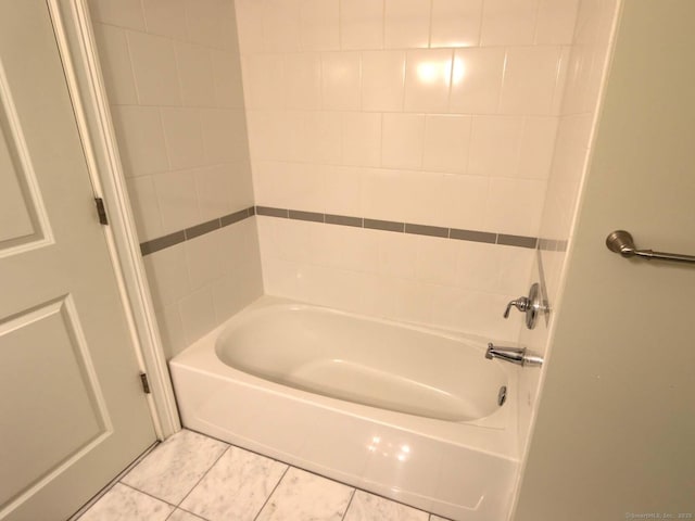 144 E Ave Apt B106, Norwalk, CT 06851 - bathroom featuring shower / bathtub combination and tile patterned flooring