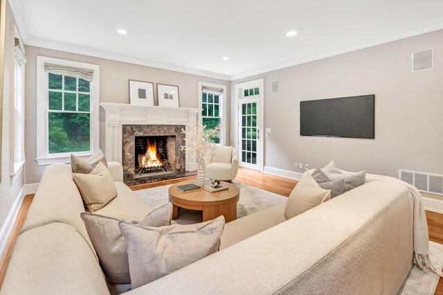 4 Lyons Plain Rd, Weston, CT 06883 - living area with wood finished floors, a premium fireplace, crown molding, and recessed lighting